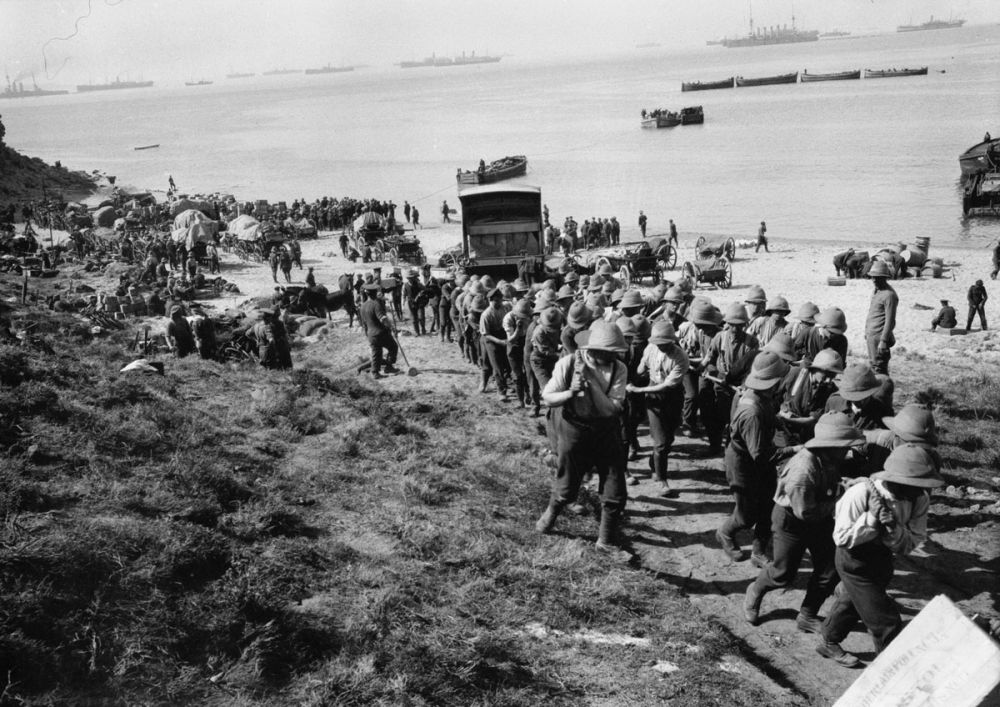 British troops hauling an ambulance wagon off W Beach.